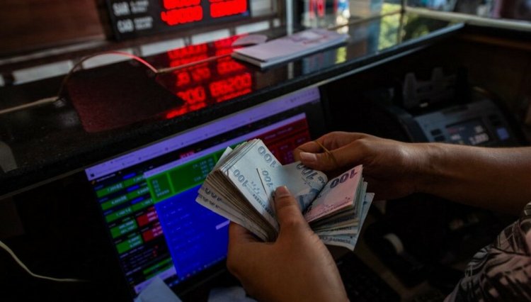 Turkey lira slumps to record low after Erdogan orders expulsions