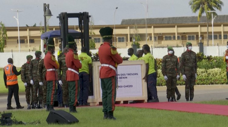 Tears, dance as Benin welcomes back looted treasures from France