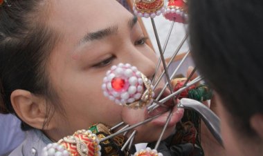 Extreme piercing cleanses souls at Thai vegetarian festival