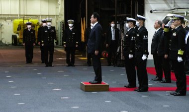 Japan PM pledges to boost military capacity