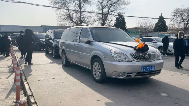 China's crematoriums struggle as Covid cases soar