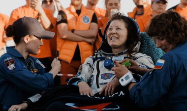 Soyuz capsule lands safely with record-setting crew