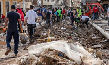 Spanish rescue teams search mall parking for victims