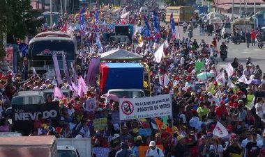 Maduro supporters march in Caracas on anniversary