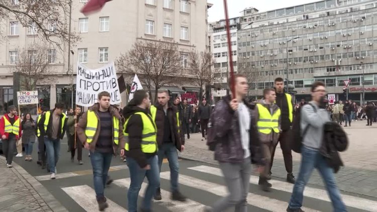 Serbian students rally with striking workers