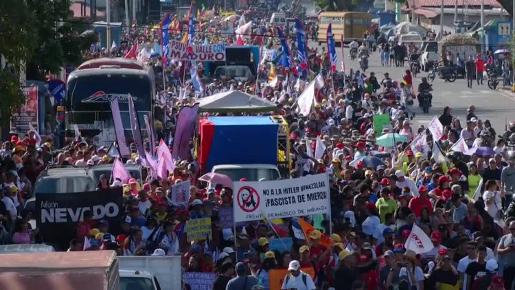 Maduro supporters march in Caracas on anniversary