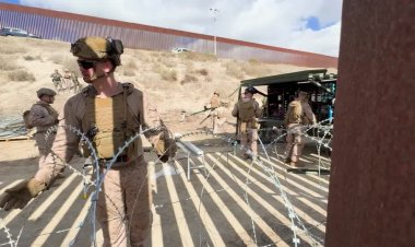 U.S. marines reinforce border with barbed wire