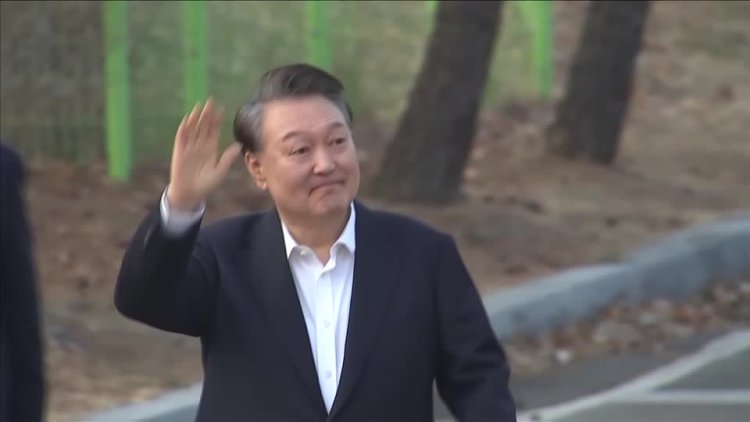 South Korea's Yoon freed but faces trial