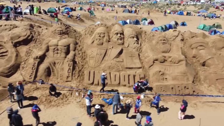 Artists craft biblical sand sculptures for Good Friday