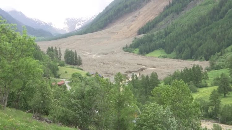 Swiss village buried by glacier collapse