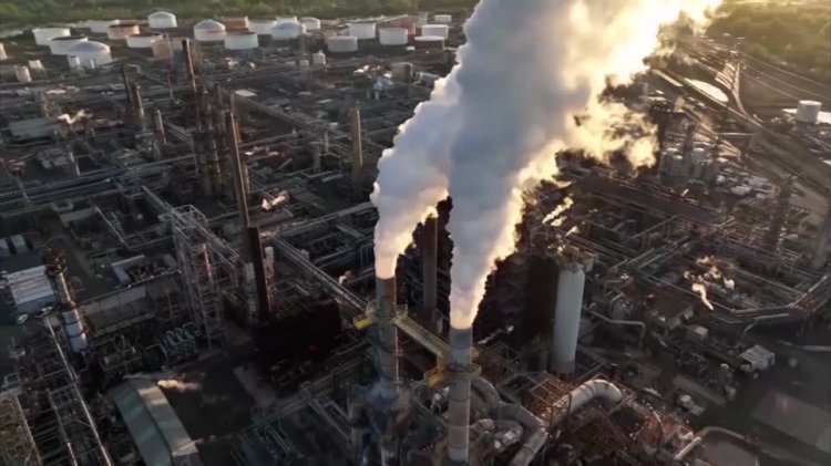 Oil prices edge higher on U.S. draw