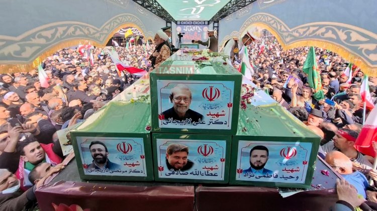 Tehran holds mass funeral for officials