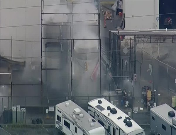 Crews battle dangerous chemical tank threat